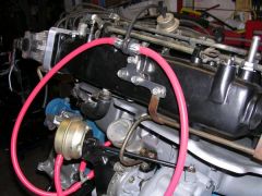 Oil line bracket was made to brace the oil line using an N42 intake and to hold the manual boost controller.