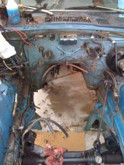 Shortly after removing the L28. What a mess!! The light blue inside engine bay is the original color from when my mom bought it.
