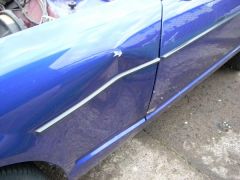 damaged fener and door came with it.....? also lttle sub frame damage... all from poor forklift opertor? again came with car